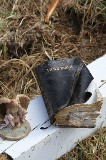 Bible and angel statue recovered from tornado rubble